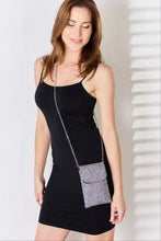 Woman in Black Mini Dress with Forever Link Rhinestone Mini Crossbody