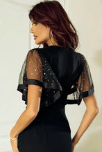 Black sheer mesh mini dress with round neck short sleeve and keyhole