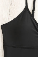 Black One-Piece Swimsuit with Gold V Detail and Cutout Chest