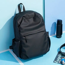 Sleek black oxford cloth waterproof backpack with multiple compartments