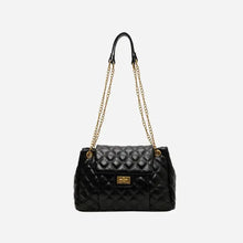 Black quilted leather shoulder bag with gold chain straps and clasp