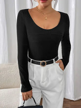 Black ribbed long sleeve bodysuit with scoop neck and gold hardware
