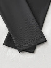 Black ribbed long sleeve crop top with leggings