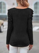 Black ribbed scoop neck puff sleeve top with pleated blouse, ruffled shoulders, long sleeves