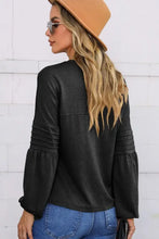 Black round neck balloon sleeve top with pleated arm details