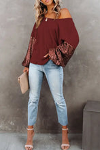 Burgundy off-shoulder blouse with lace sleeves and bell sleeve length