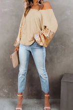 Beige off-shoulder top with gold sequin puff sleeves and bell sleeve length