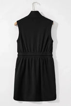 Black sleeveless zip mini dress with drawstring waist