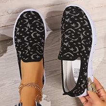 Black slip-on flat loafers with grey moon pattern and star design