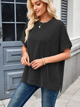 Black striped waffle knit poncho top with ribbed oversized fit