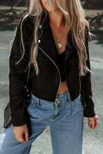 Black suede cropped moto jacket with silver zipper and sleeve length detail