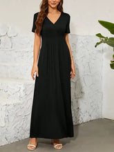 Black surplice short sleeve maxi dress with elastic waist