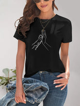 Black T-Shirt with Dog Paw and Hand Graphic for Women