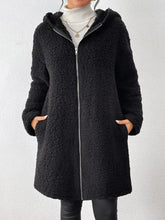 Black textured sherpa hooded coat with long sleeves and pockets