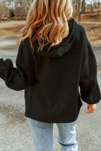 Black oversized hoodie with bell sleeves and drawstring hood in various sleeve lengths