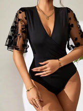Black V-Neck Bodysuit with Floral Mesh Sleeves Woman Bodysuits