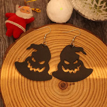 Black witch hat shape earrings with jack-o-lantern faces for Halloween