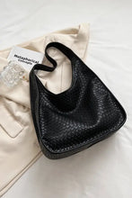 Black faux snakeskin leather shoulder bag with woven texture