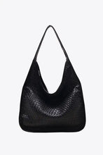 Black woven leather shoulder bag with snakeskin texture and single strap