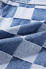 Close-up of blue and white checkered flannel shirt fabric