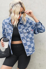 Blue and white checkered denim jacket with button closure