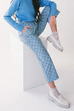 Blue and white checkered wide-leg velour jogger pants with quilted texture