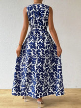 Blue and white printed surplice sleeveless maxi dress with tie waist