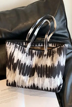 Black and white tie-dye printed PU leather tote bag with silver handles