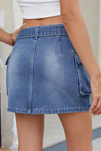 Blue Denim Mini Skirt with Cargo Pockets and Crisscross Straps