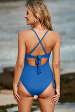 Blue Ribbed One-Piece Swimsuit with Crisscross and Cutout Chest
