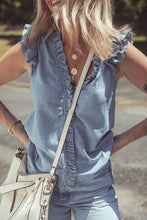 Blue velvet ruffled sleeveless top with button-down front and white crossbody bag