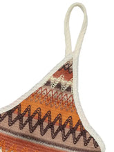 Orange and brown patterned boho geometric bikini top with white straps