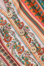 Boho multicolored floral print shirt with wooden buttons and orange accents
