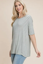 Woman in BOMBOM Striped Round Neck T-Shirt in light green and white stripes