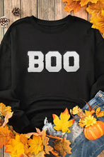 Black and white boo round neck long sleeve sweatshirt for women with fuzzy texture
