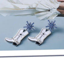 White boot alloy dangle earrings with pearls, rhinestones, and blue snowflake studs