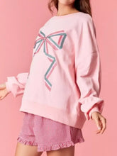 Pink oversized bow crew neck sweatshirt with large embroidered pink green and white striped bow machine wash cold