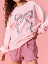 Pink oversized bow crew neck sweatshirt with large embroidered red and green plaid bow detail machine wash cold
