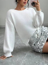 White dropped shoulder knit cardigan with oversized sweater ribbed cuffs