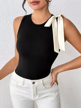 Black sleeveless bodysuit featuring a cream satin bow on the shoulder with elegant bow detail design