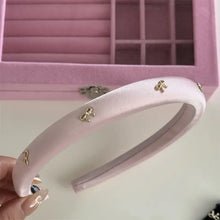 Light pink satin bow trim headband with alloy bow embellishments