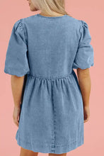 A light blue denim dress with bowknot round neck, puffed sleeves, and gathered waist in denim material