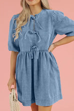 Blue denim dress with puffed sleeves and bowknot round neck tie-front neckline in a half sleeve denim dress design