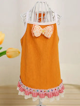 Bowknot ruffled hem pet top in orange ribbed slightly stretchy fabric