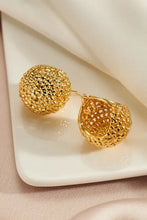 Gold braided basket metal hoop earrings with textured open hoops