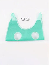 Breathable pet shower hammock in mint green polyester mesh with openings and straps