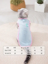 Back view of breathable summer pet top in light blue and pink with green logo