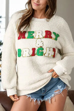 Cream-colored sherpa bright round neck long sleeve sweatshirt with Merry and Bright design