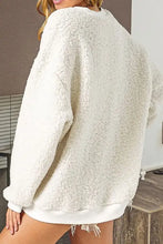 Cream-colored fuzzy bright round neck long sleeve sweatshirt with Merry and Bright Christmas design