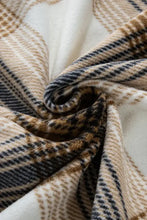 Brown and beige plaid wool blanket with black stripes and patch pockets